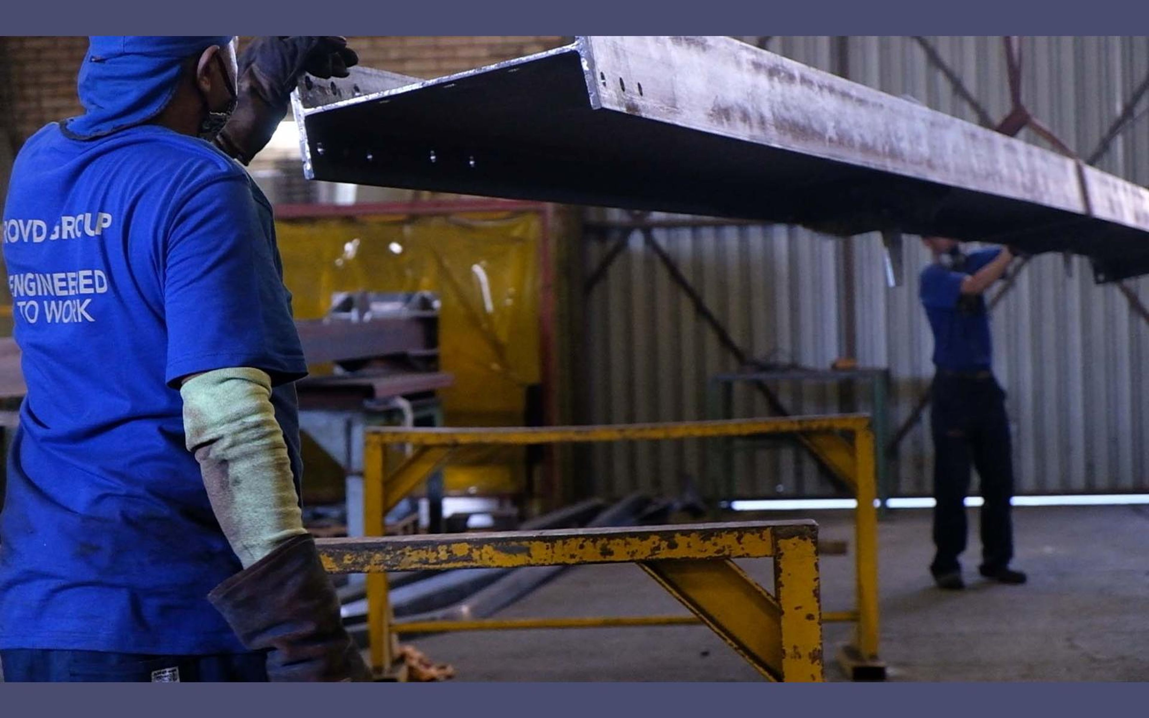 Overhead crane over steel frames in the fabrication bay