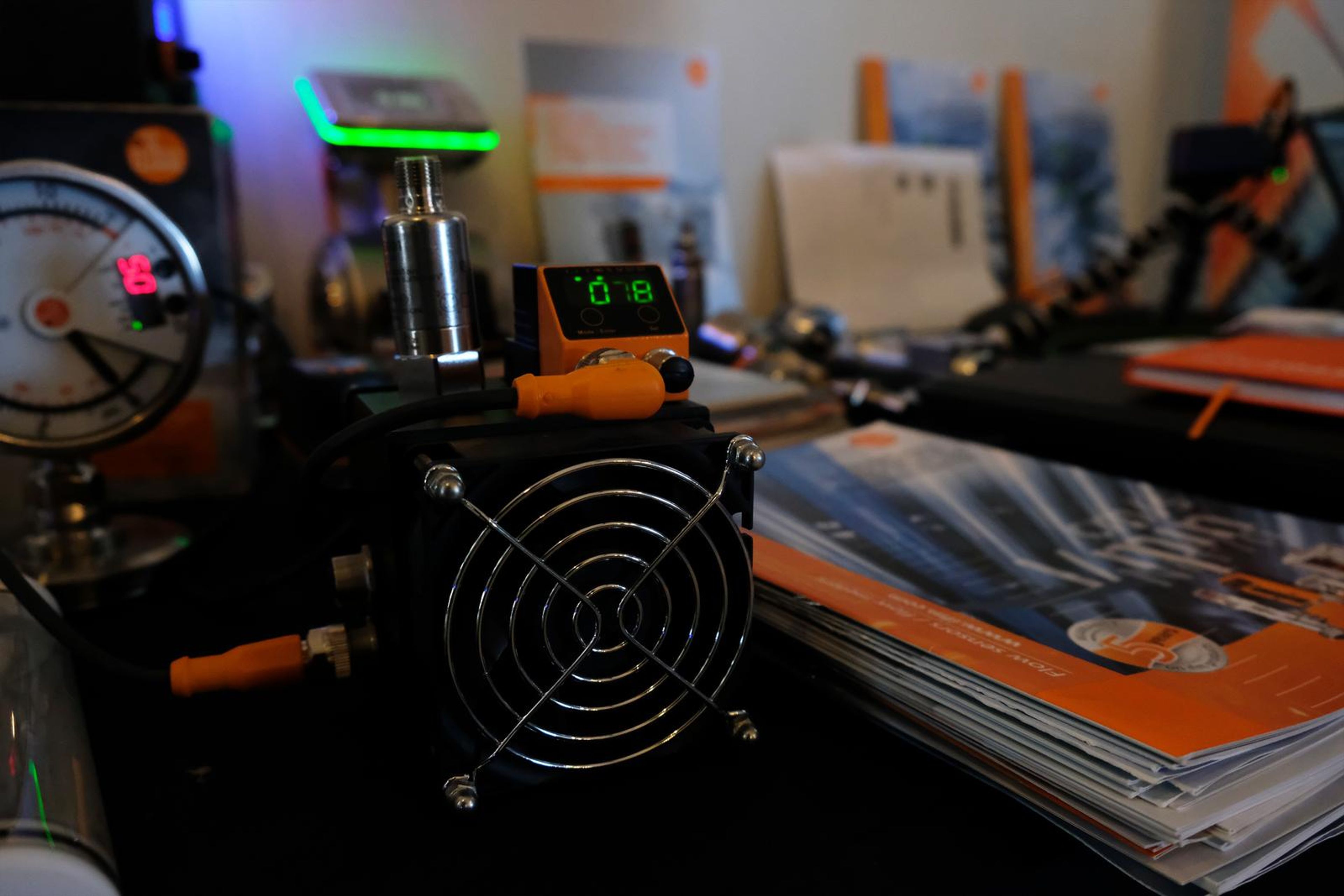 IFM sensor with a digital display and brochures