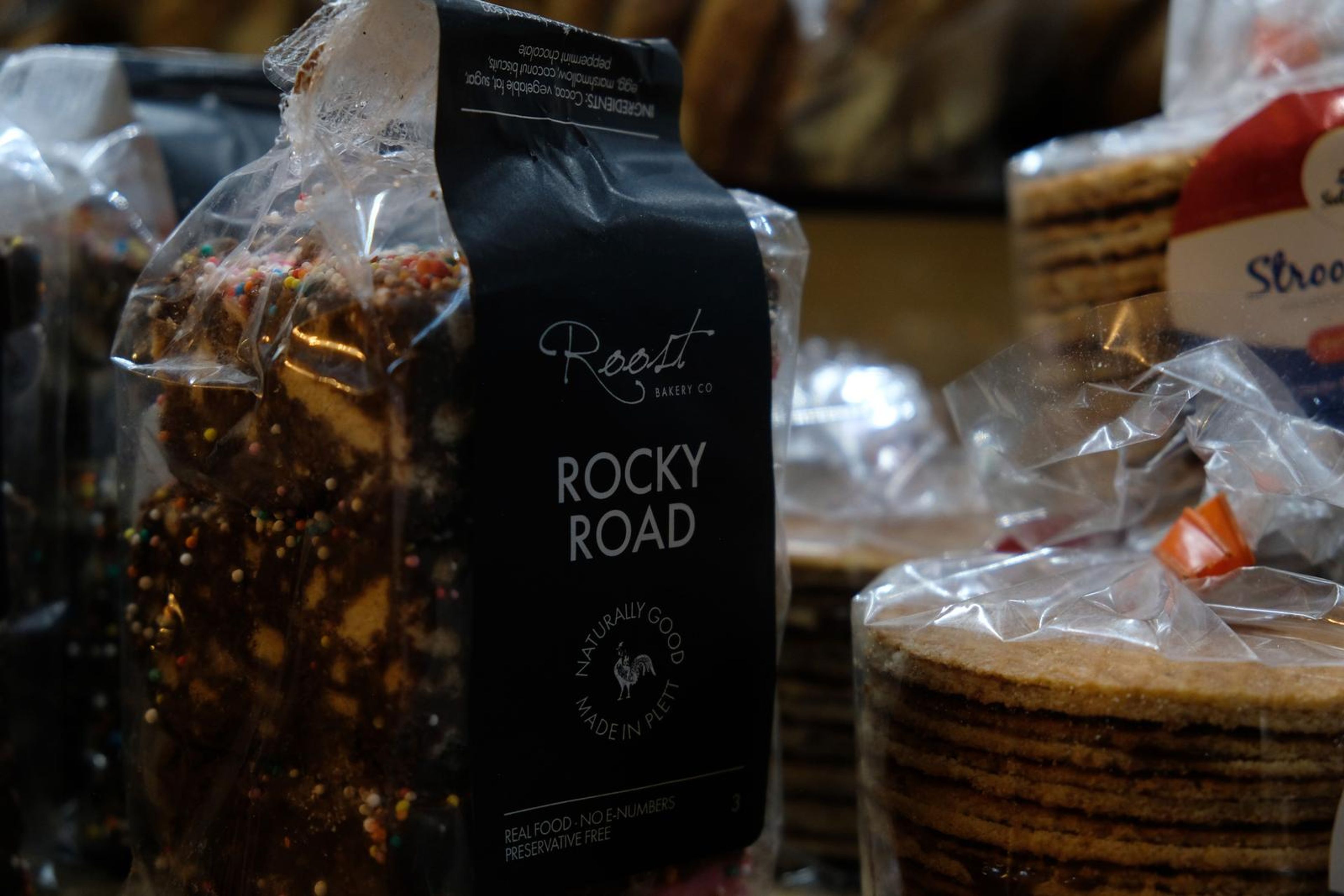 Rocky road and biscuits in packaging on the counter