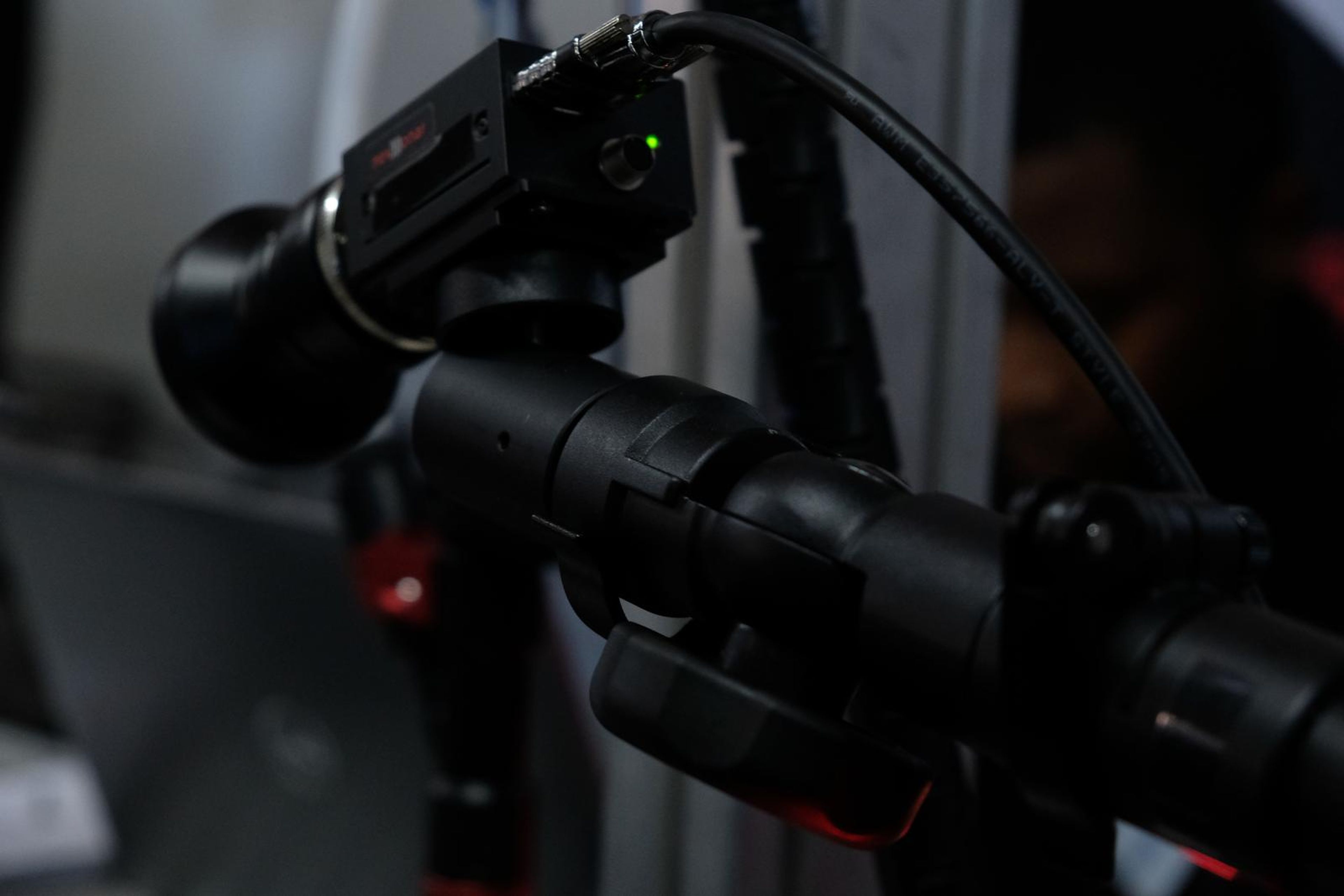Close view of a camera lens on the Desoutter demonstration rig