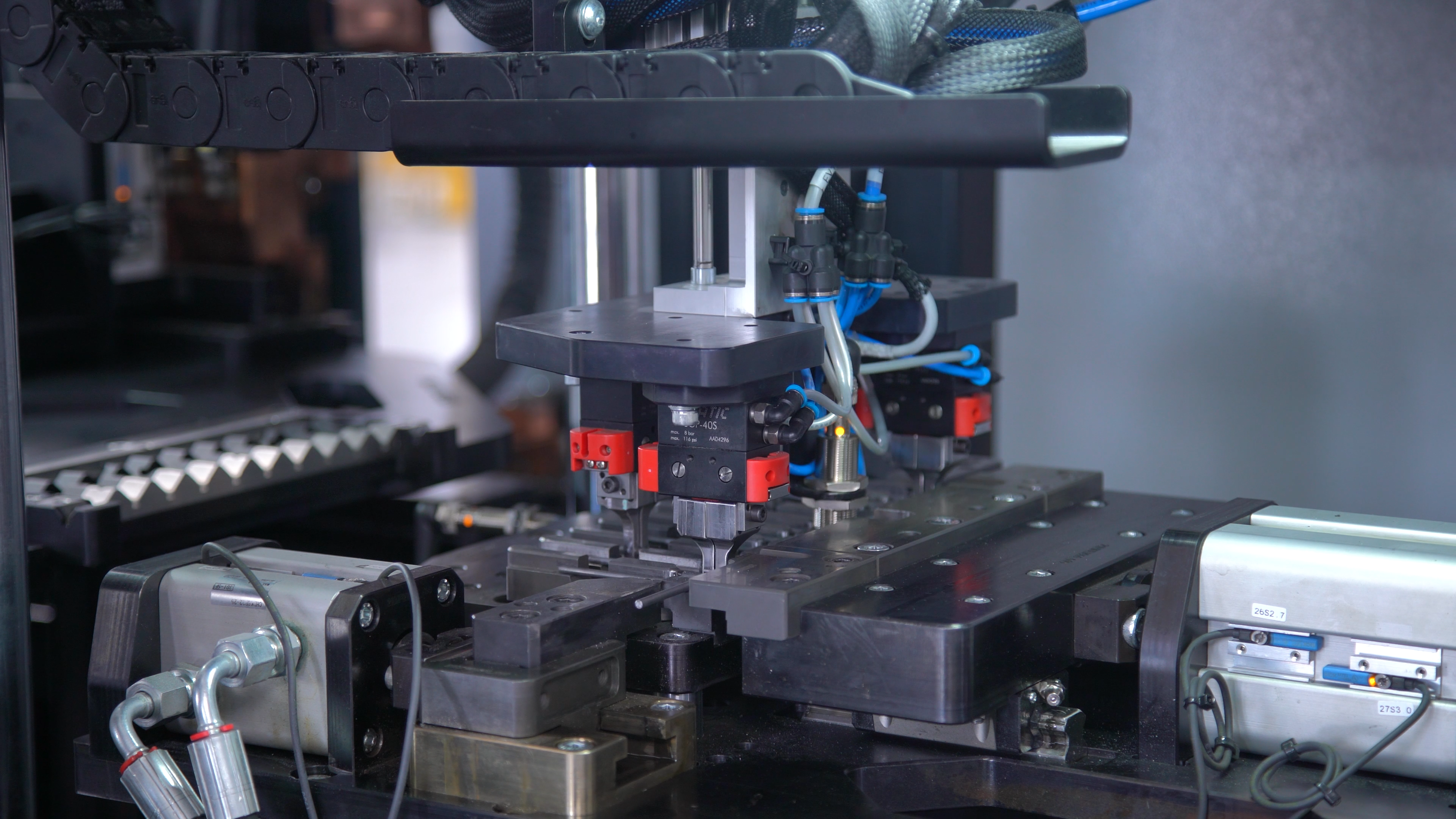 Metal press tooling with a control cable in a workshop