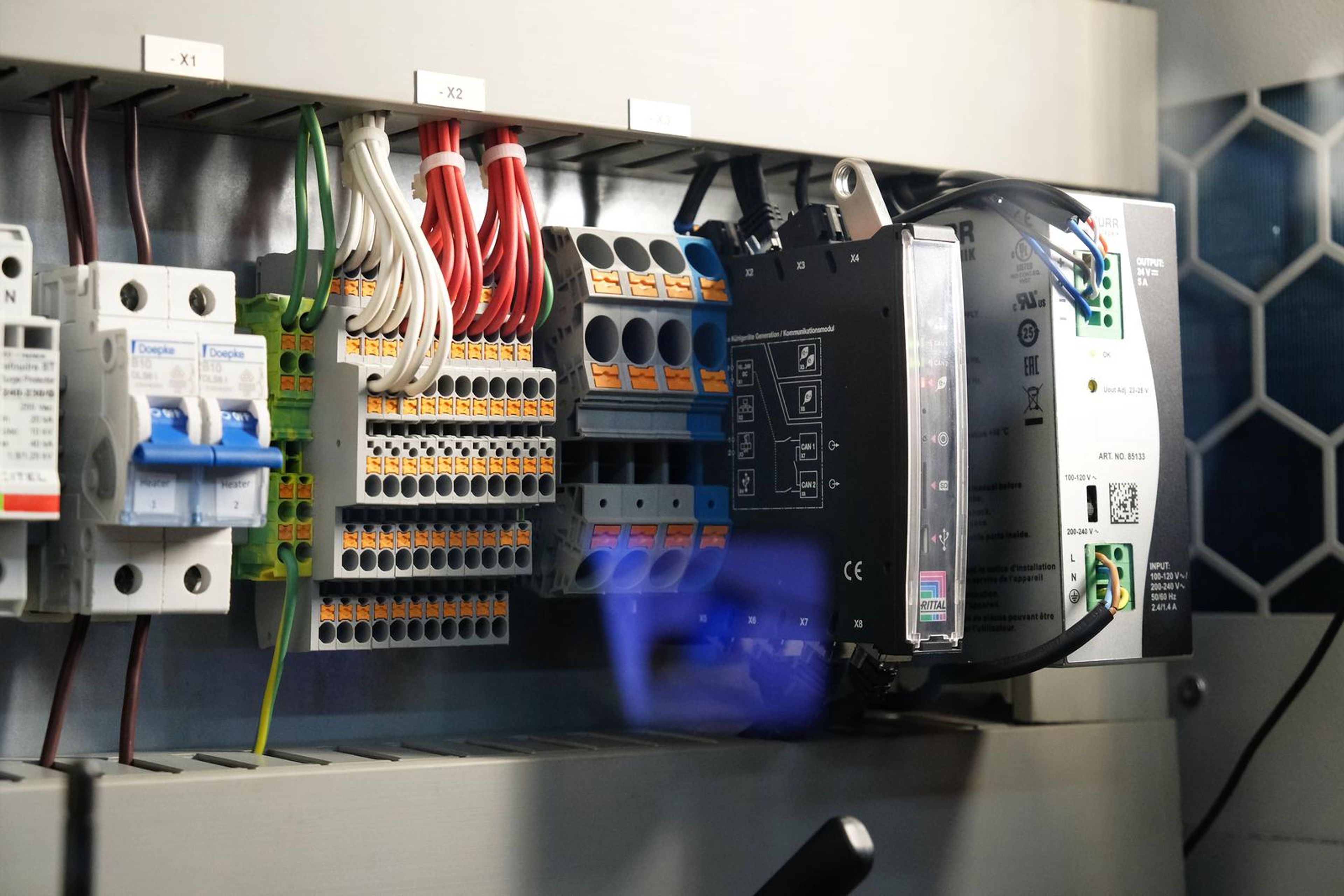 Circuit breakers and terminals in a demonstration cabinet