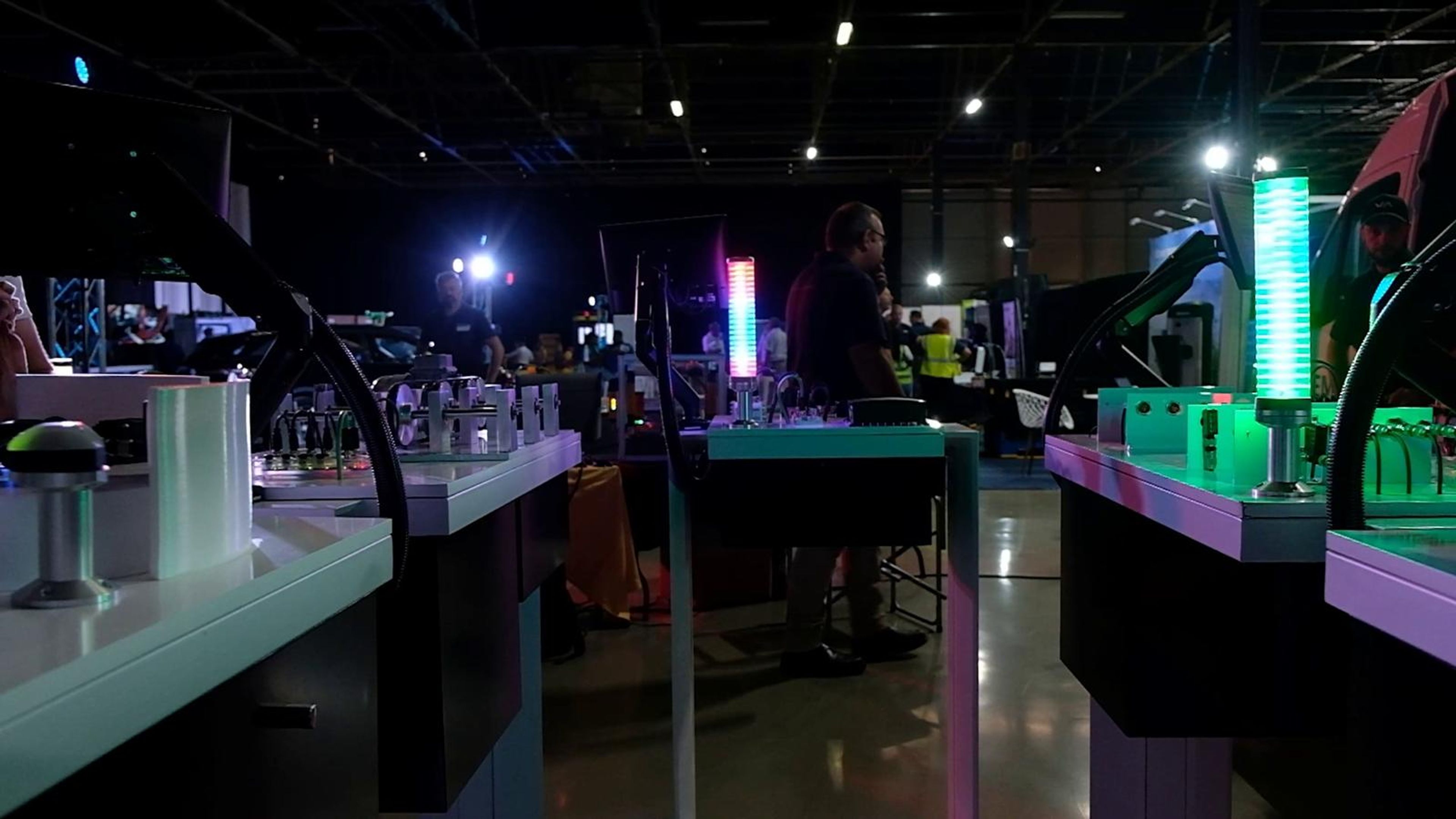 Wide view of the bar counter and exhibits in the dark hall