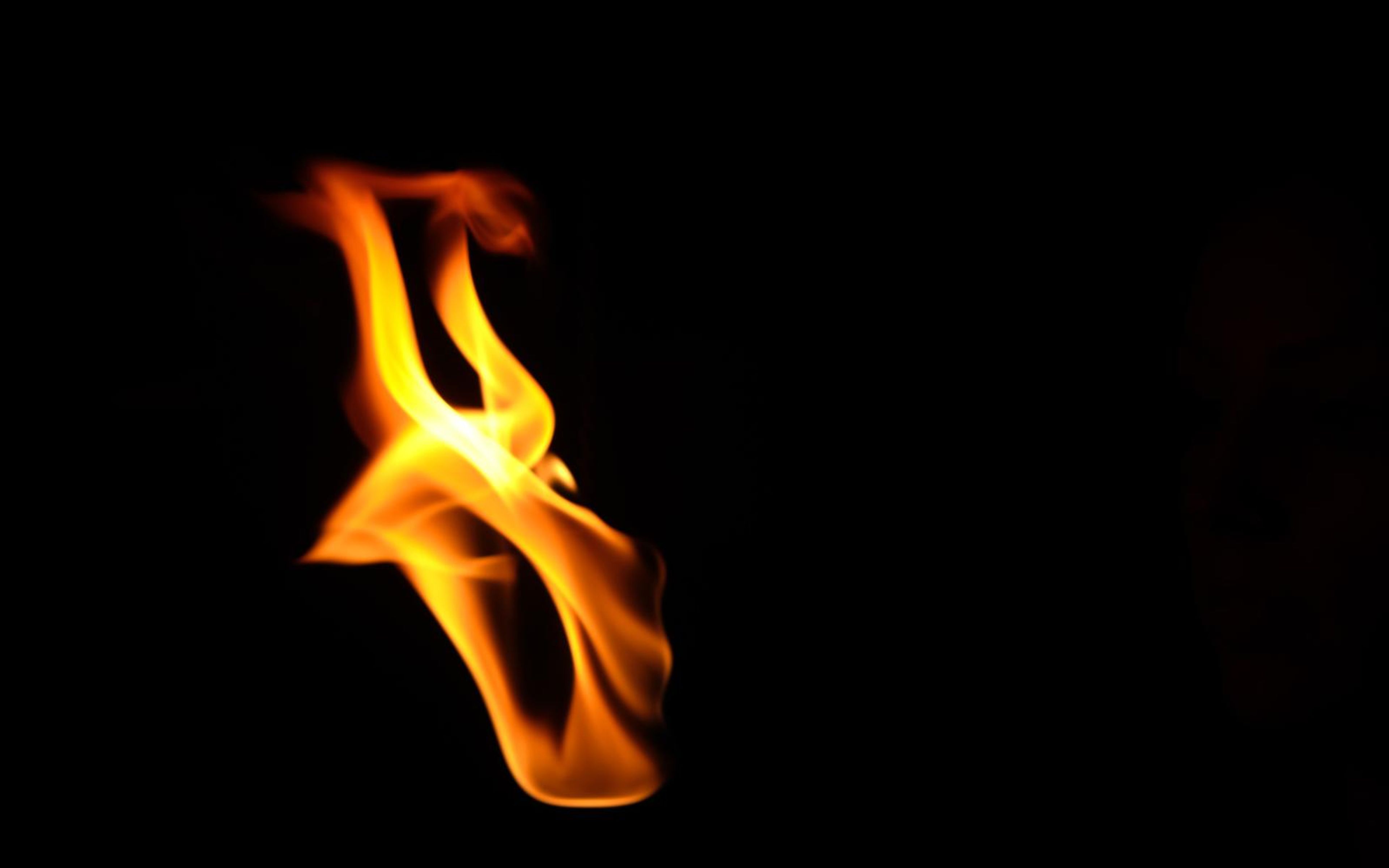 Flame twisting in a narrow s-shape at the left side