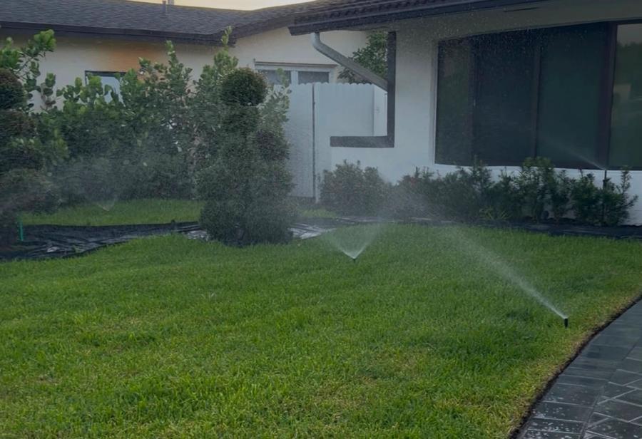 Sprinkler system watering a lawn