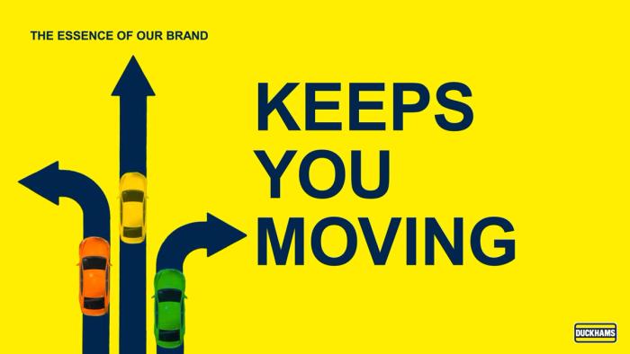 A yellow brand slide reading "Keeps You Moving", with cars turning along arrows.