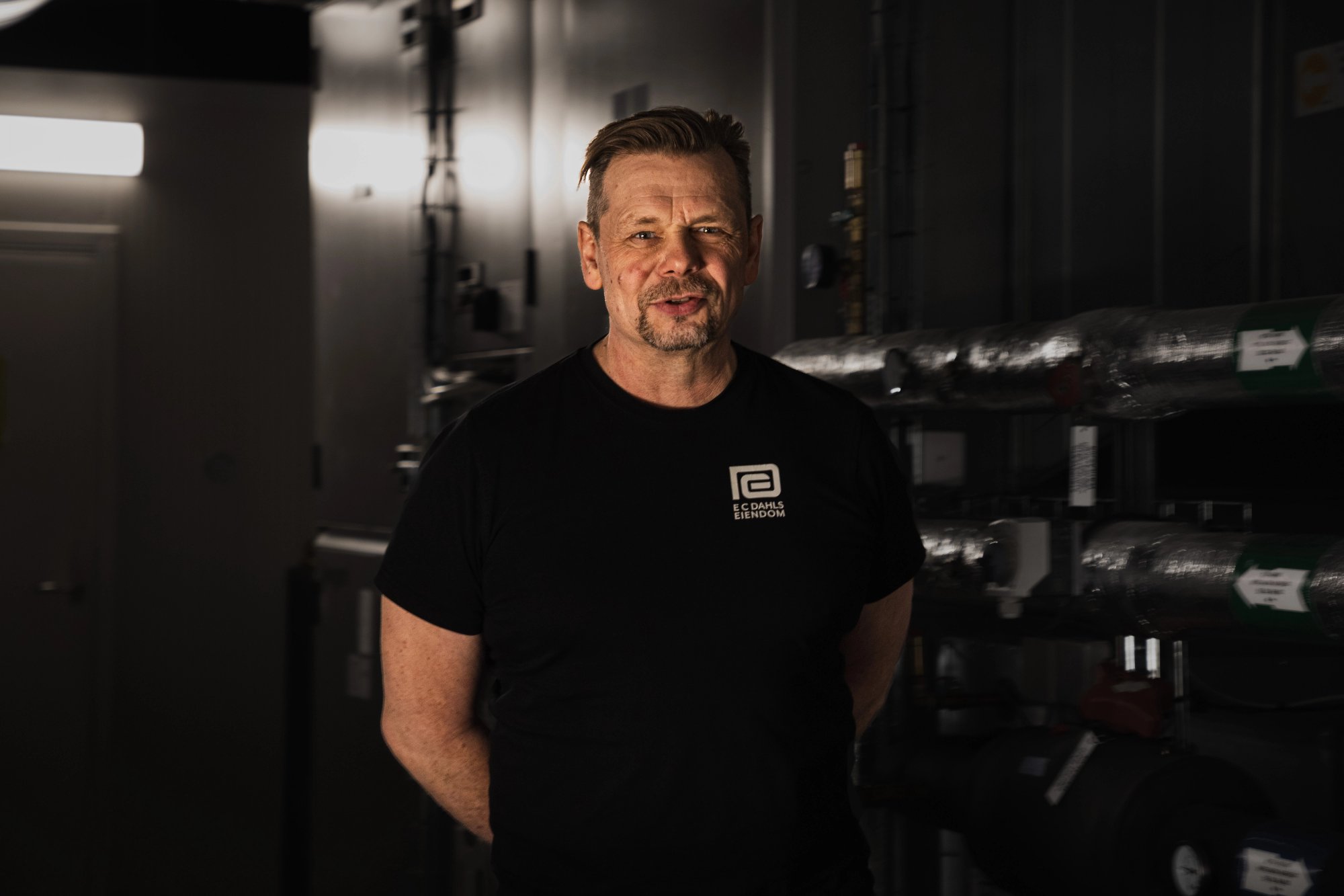 Morten Foss, working at E C Dahls, presenting their technical room. 