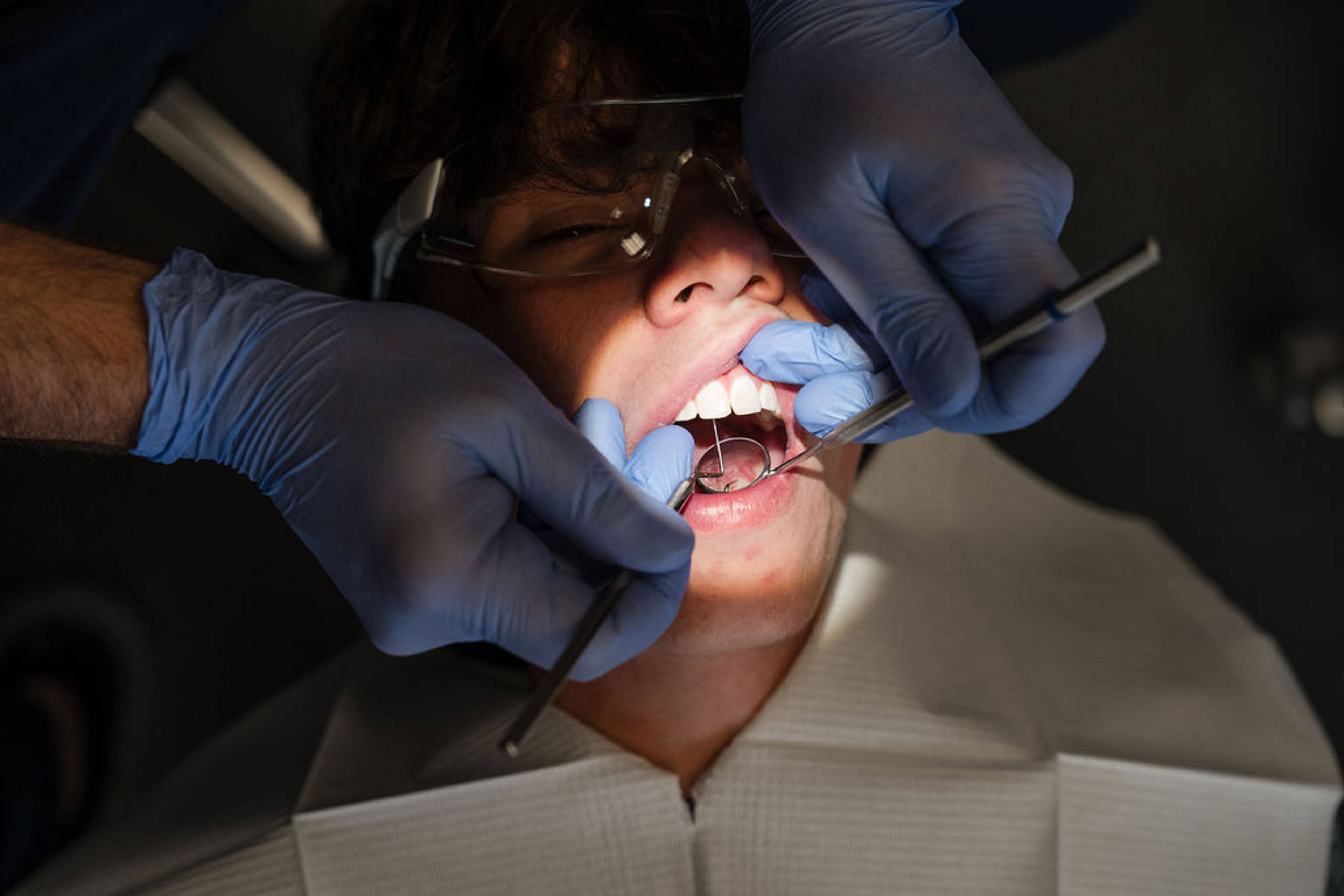 Patient receiving a comprehensive dental examination and oral health assessment using specialised instruments during a general dentistry appointment at Pontesbury Dental.