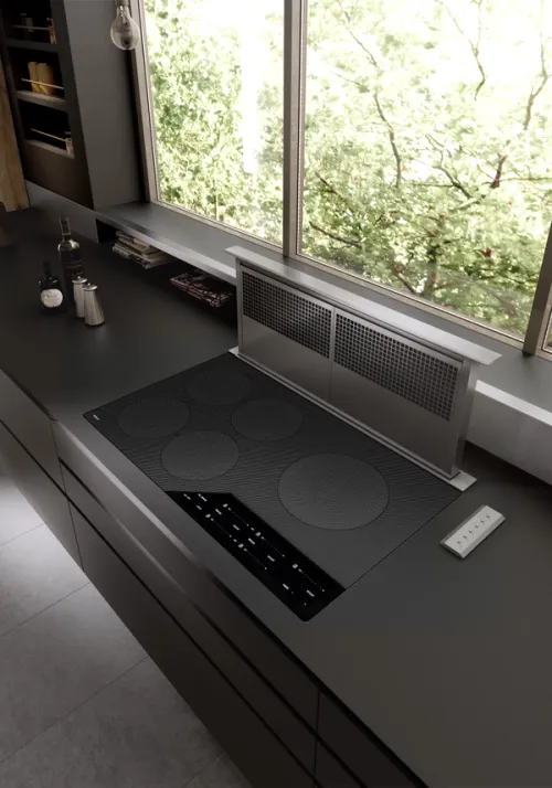 Ceramic hob with integrated countertop extractor CGI