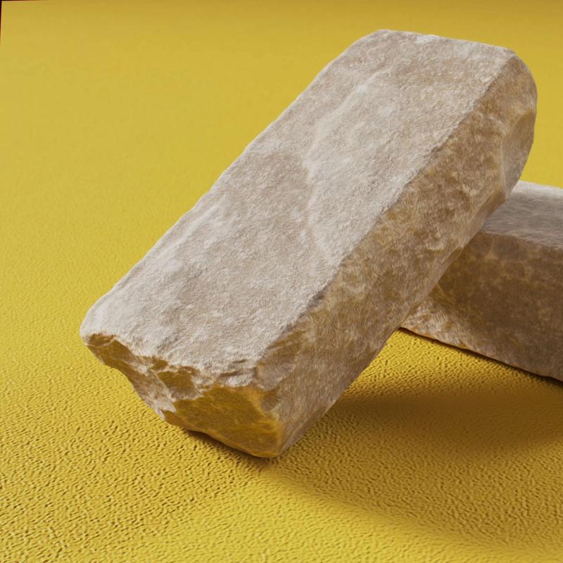3D scanned stone blocks on a yellow concrete floor