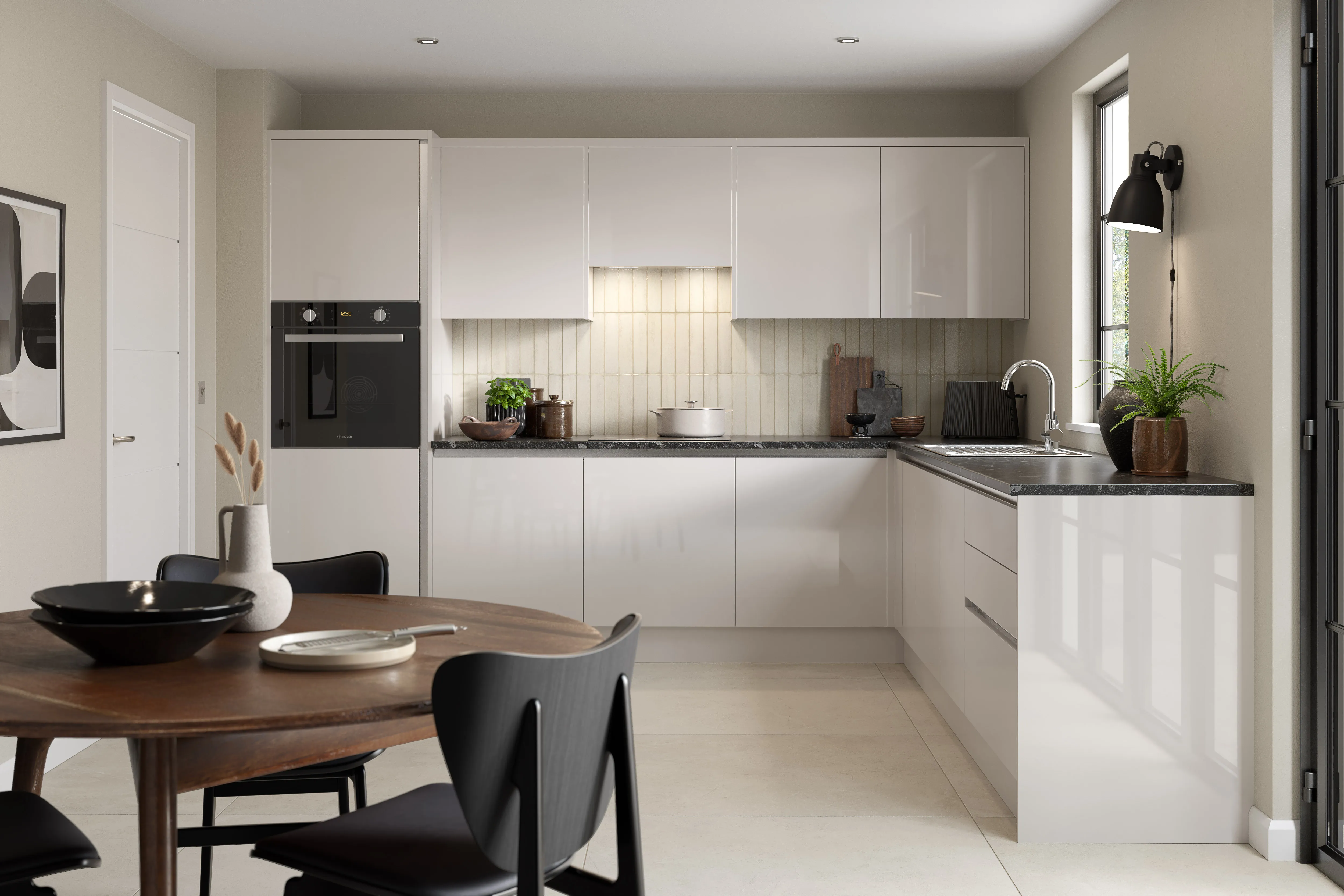 Cashmere handleless kitchen interior with dark surfaces and basic stainless hardware
