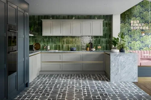 CGI blue and grey handleless kitchen alongside deep green tiles and leafy tropical styling influences.