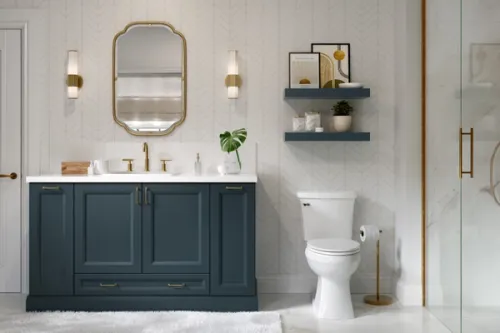 A light and airy bathroom interior with antique brass fittings and art deco influences