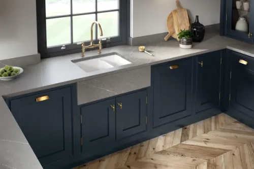 Kitchen sink CGI with grey worktops and blue cabinetry