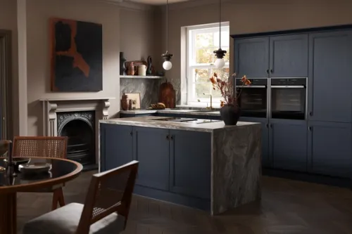 Regent blue Shaker kitchen CGI with a palette of Charleston grey walls, statement marble surfaces and rich woods, all selected to tell a story of sophistication