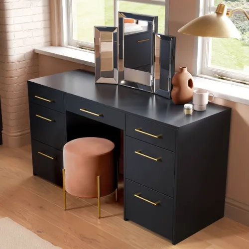 CGI bedroom scene showing a detailed view of a blue dressing table with modern brass handles