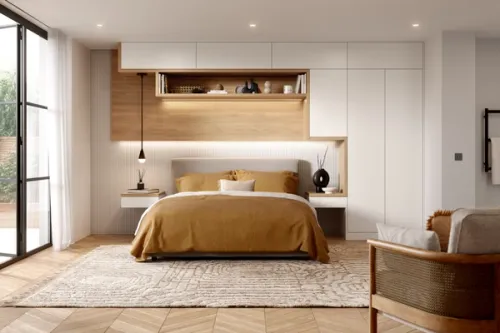 A sleek sophisticated bedroom interior with white handleless cabinetry and chunky timber frames and panels which bring a touch of warmth and organic charm.