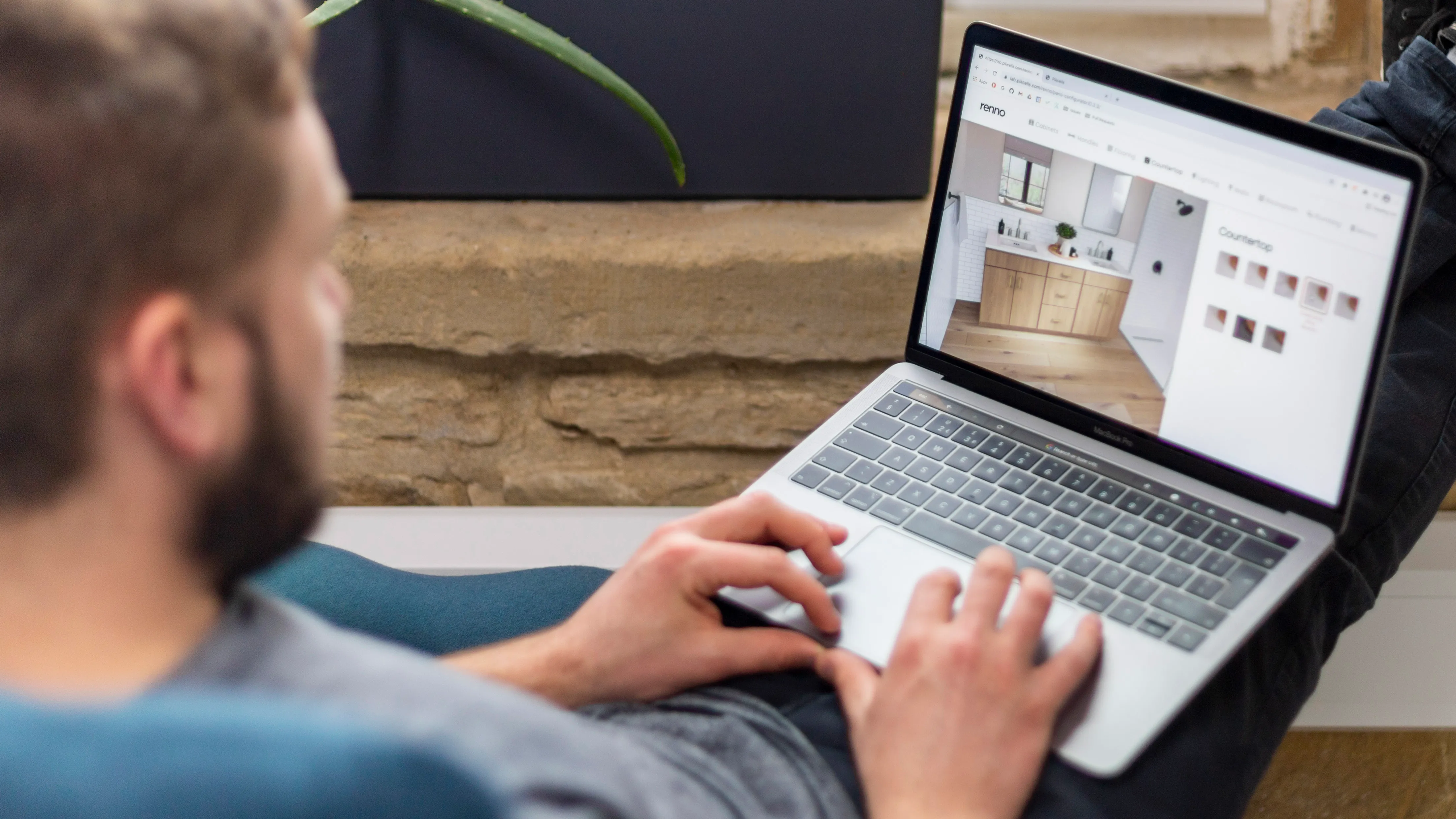 Renno bathroom Visualizer displayed on a laptop