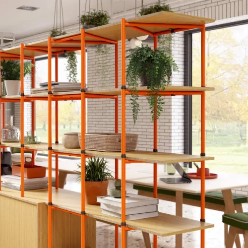Orange Bamboo modular shelving system storing various plants, bowls and books