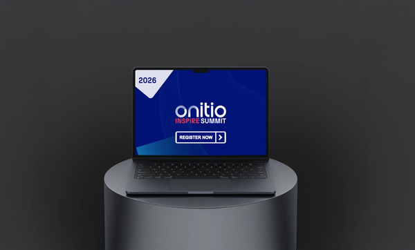 a laptop that says onitio inspire summit on the screen