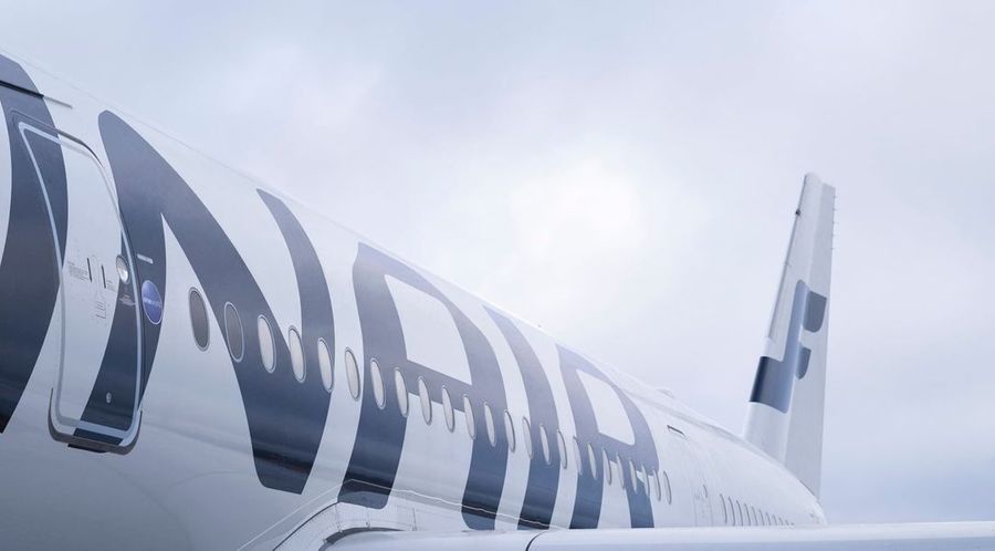 Close-up detail picture of a Finnair plane, highlighting the distinctive features of the aircraft operated by Finnair.