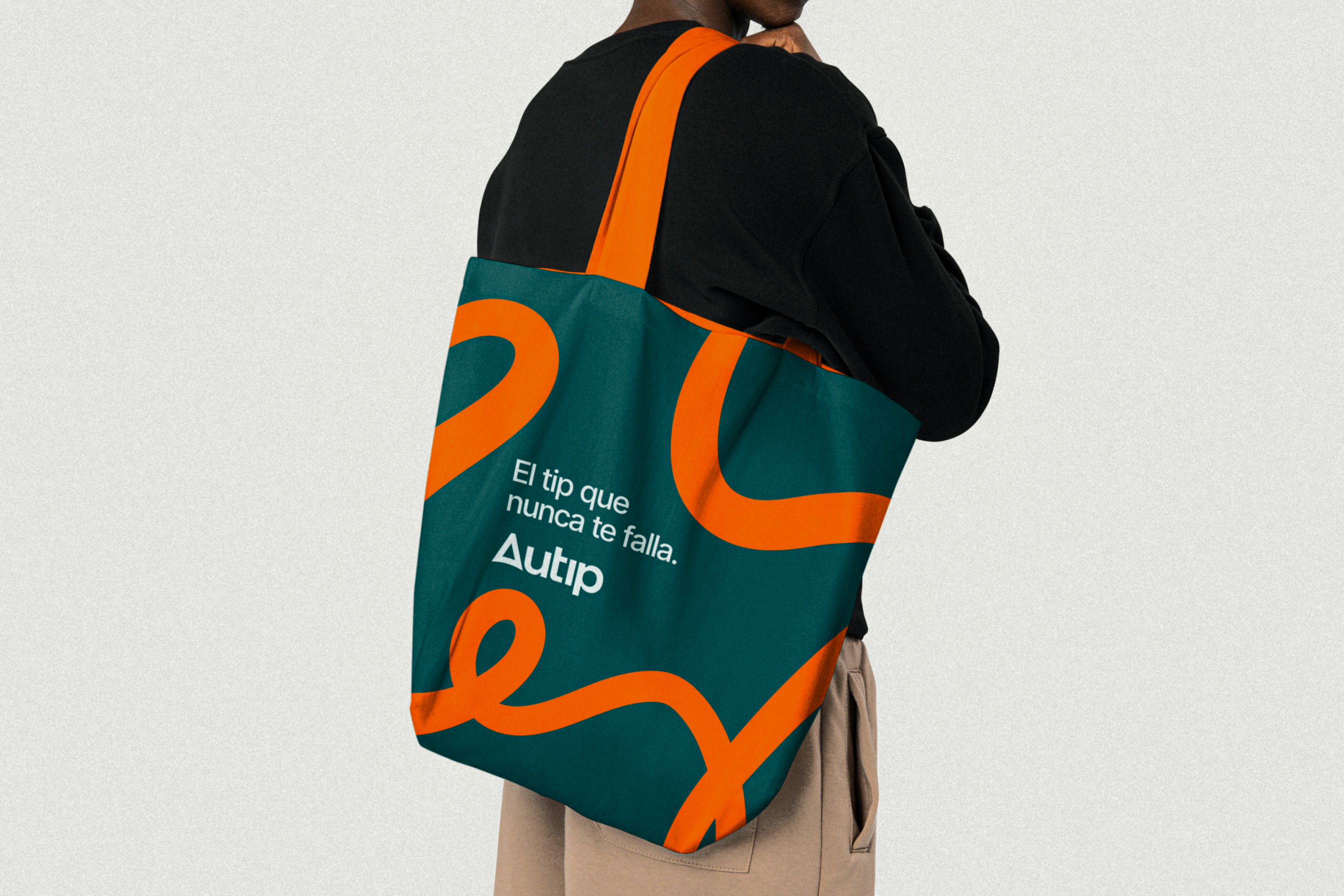 Teal and orange Autip branded tote bag