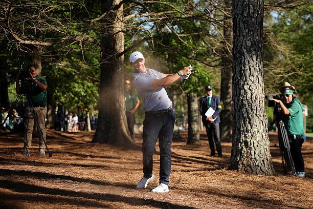 Cameron Young surges into a share for the lead with scrambling Rory McIlroy
