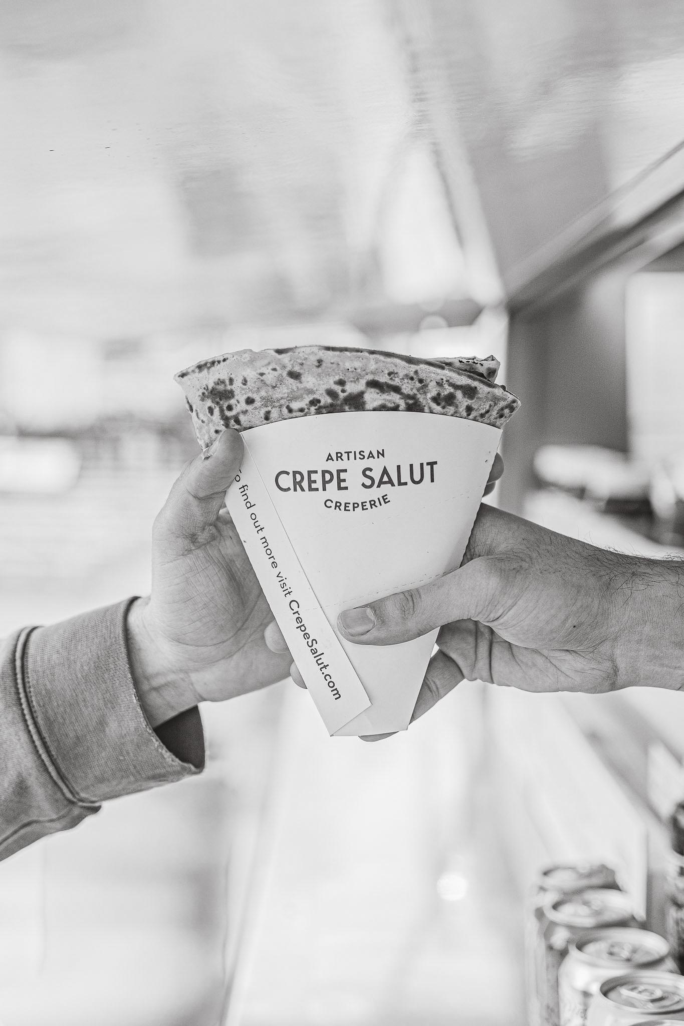 A crepe in a Crepe Salut branded cone