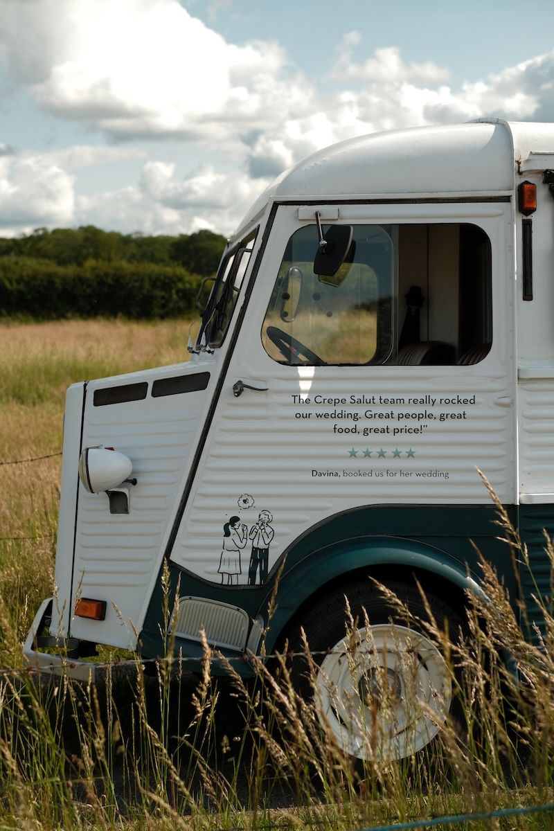 The crepe van parked in long grass
