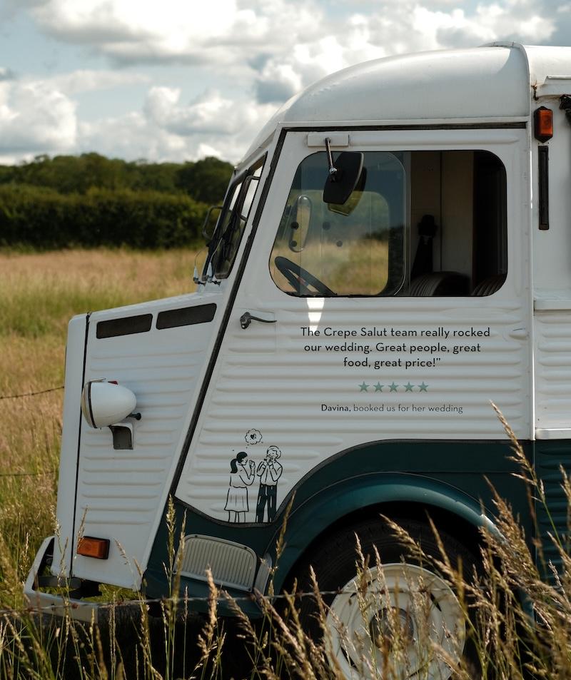 The crepe van parked in long grass