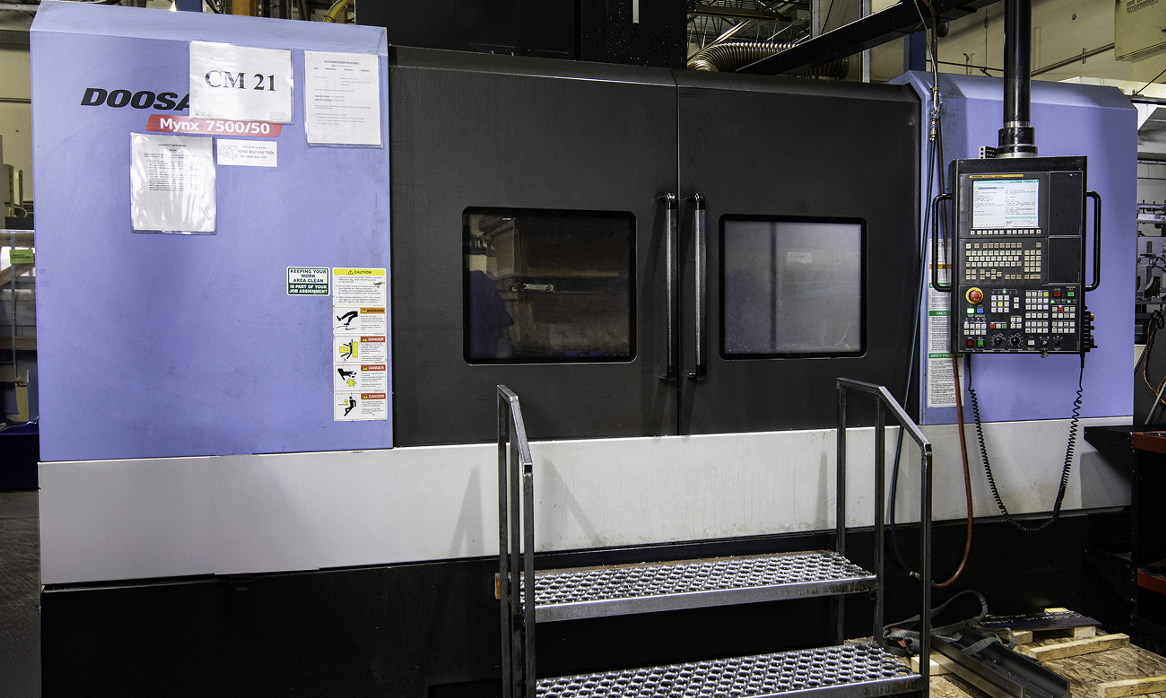 Doosan Puma vertical machining centre with an access platform