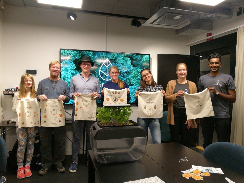 ecobloomers proudly displaying tote bags