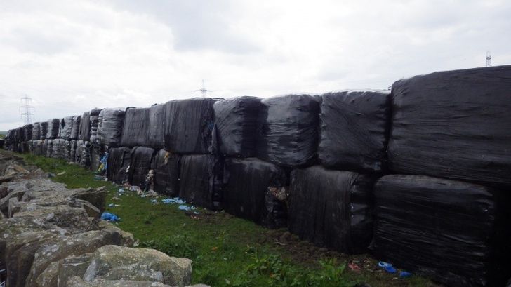 Baled waste illegally deposited at Heald Top Farm, Lancashire