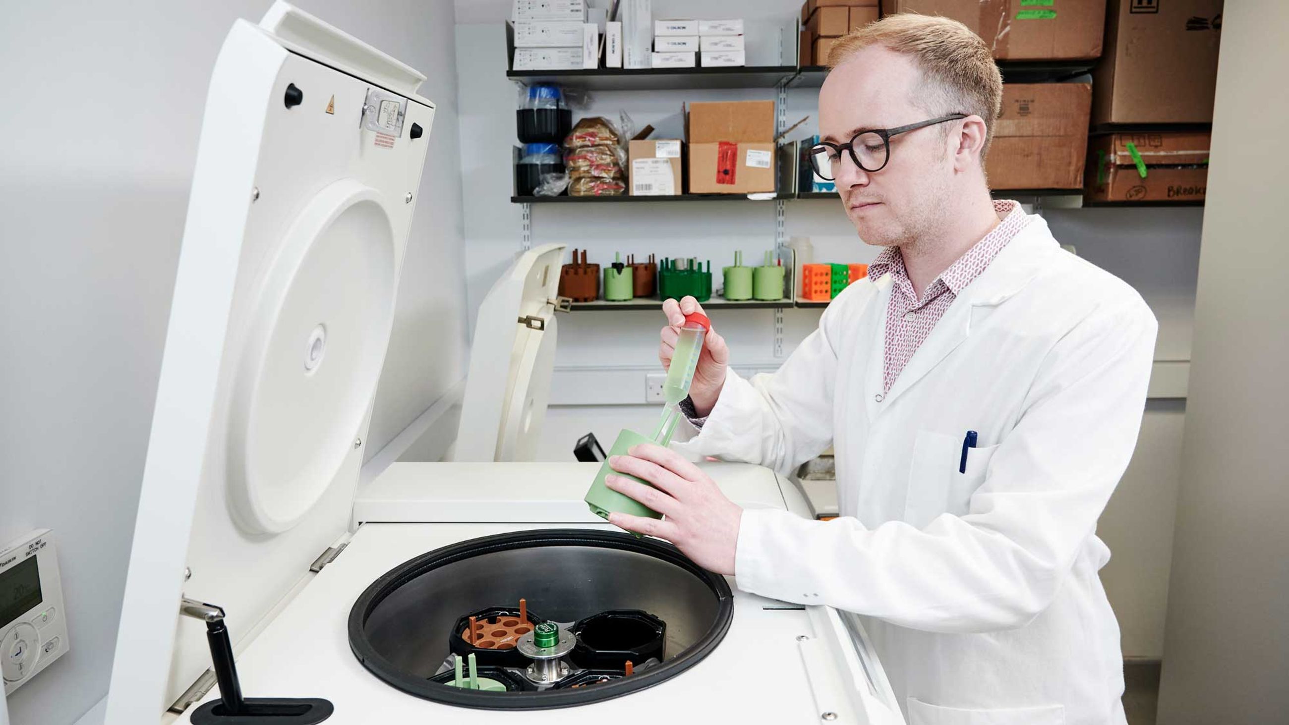 Professor Stephen Wallace harvesting engineered bacteria for analysis.