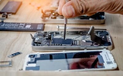 Apple iPhone being repaired