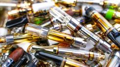 Close up of waste vape catridges
