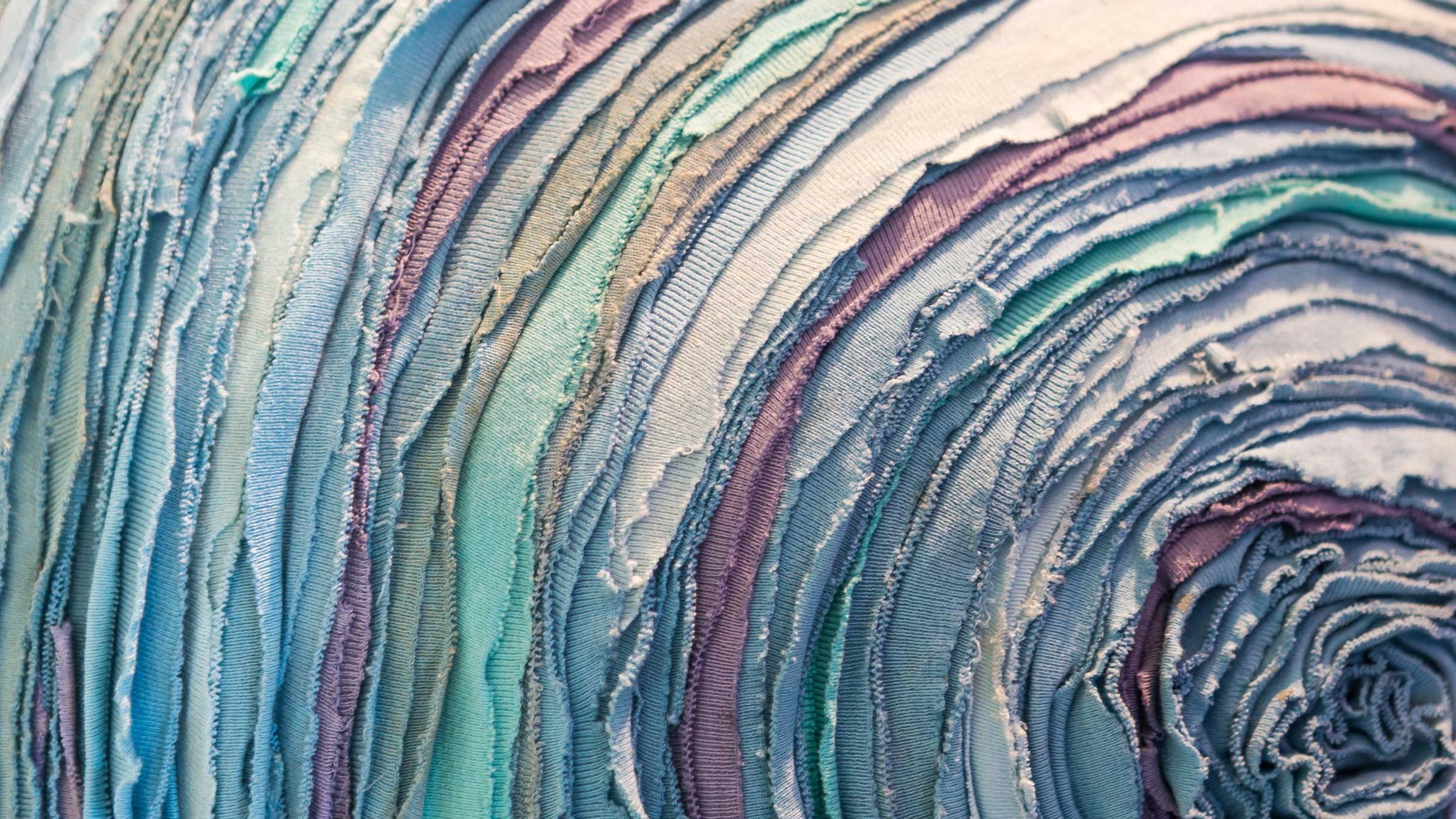 Roll of textiles for recycling