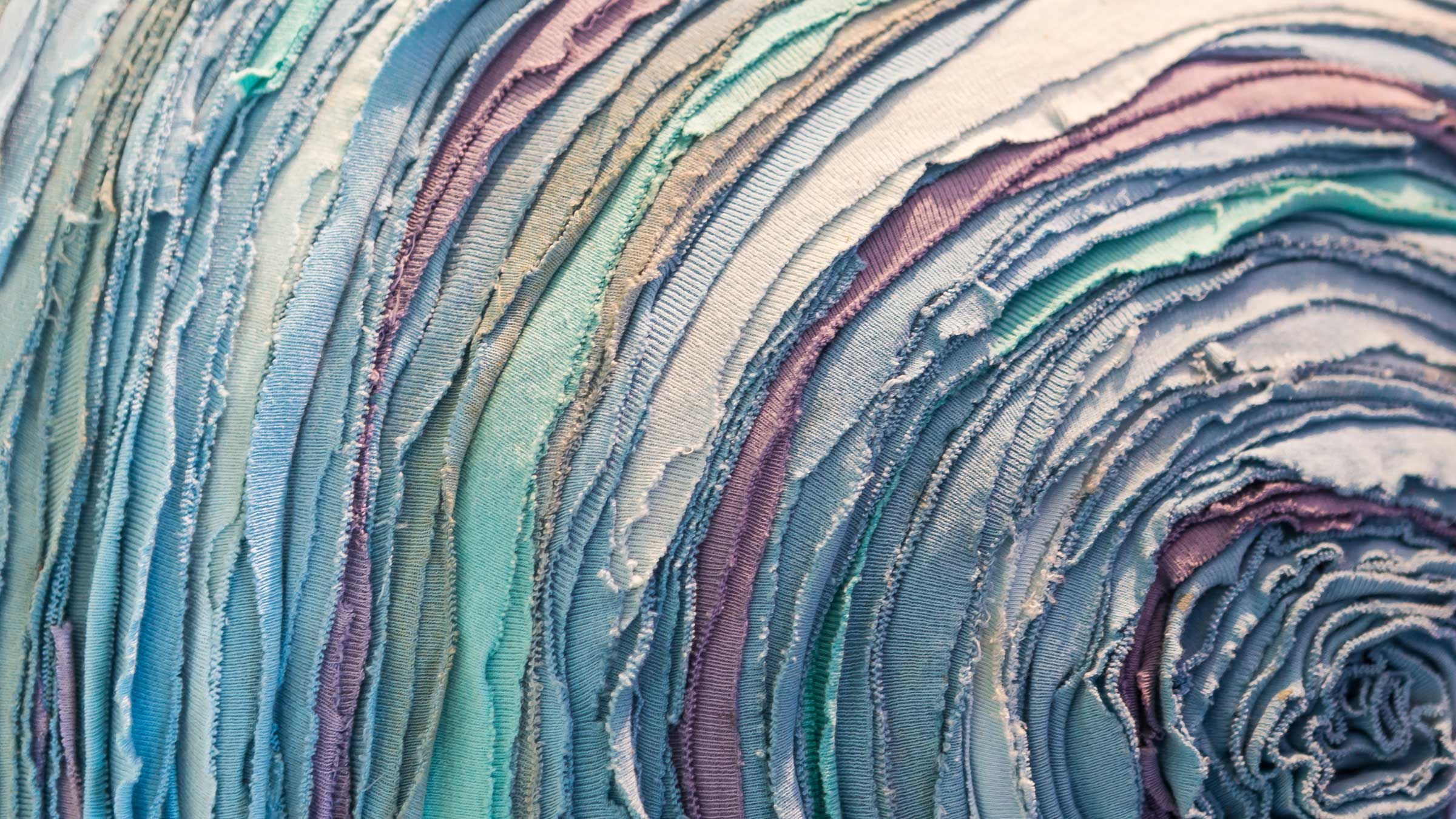 Roll of textiles for recycling