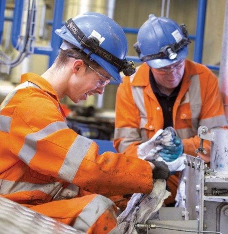 Young worker in a recycling plant