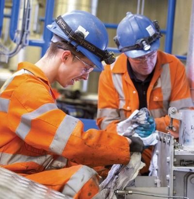Young worker in a recycling plant