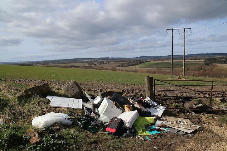 Fly-tipping waste left in rural area