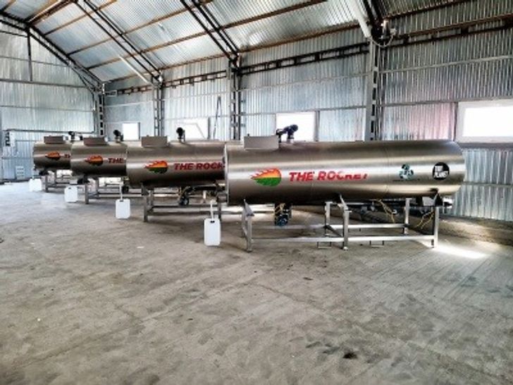 Four Tidy Planet rocket composters in a warehouse