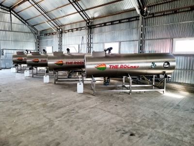 Four Tidy Planet rocket composters in a warehouse