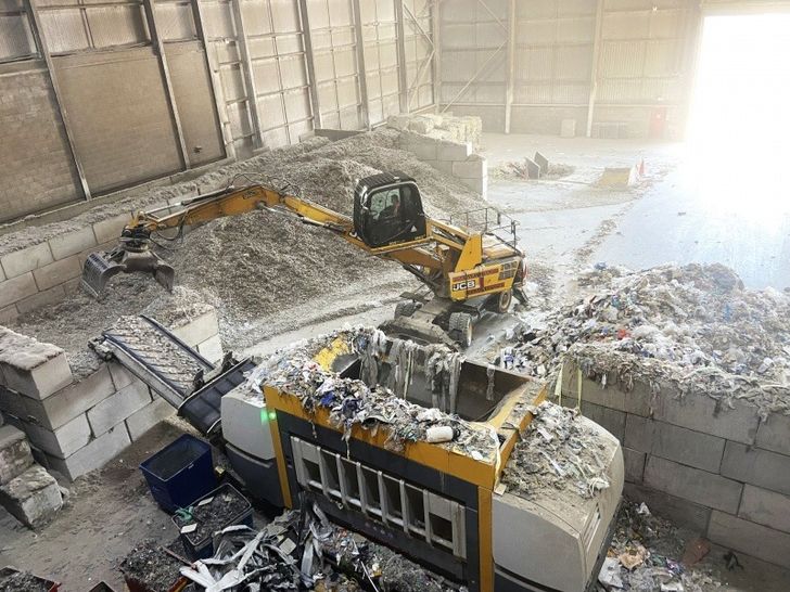 Material being shredded at Tom White Waste