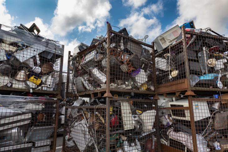 Waste electrical and electronic equipment collected in metal cages