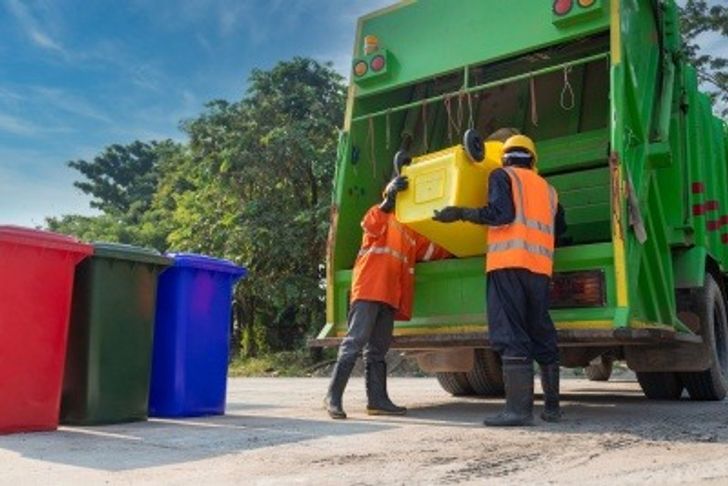 Recycling collection service with different coloured bins