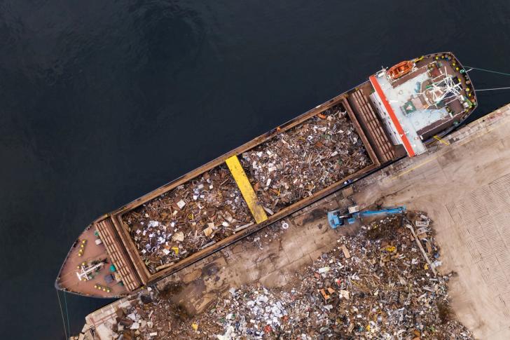 Aerial view of scrap metal loaded onto a ship
