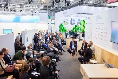 Attendees at a presentation at the IFAT exhibition