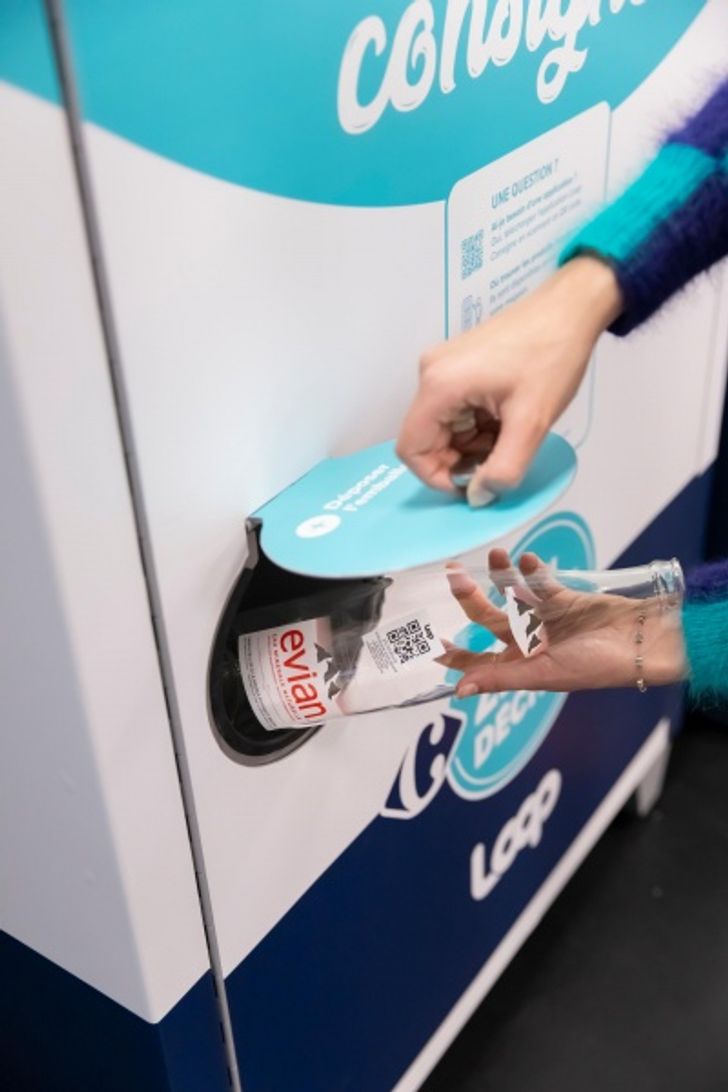 Packaging being placed in a return bin