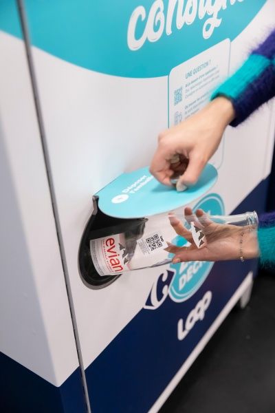 Packaging being placed in a return bin